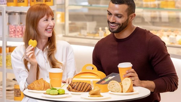 Couple enjoying a breakfast at a Caesars bakery cafe