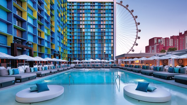 Day pool at The LINQ Hotel in Las Vegas with the High Roller wheel in the background