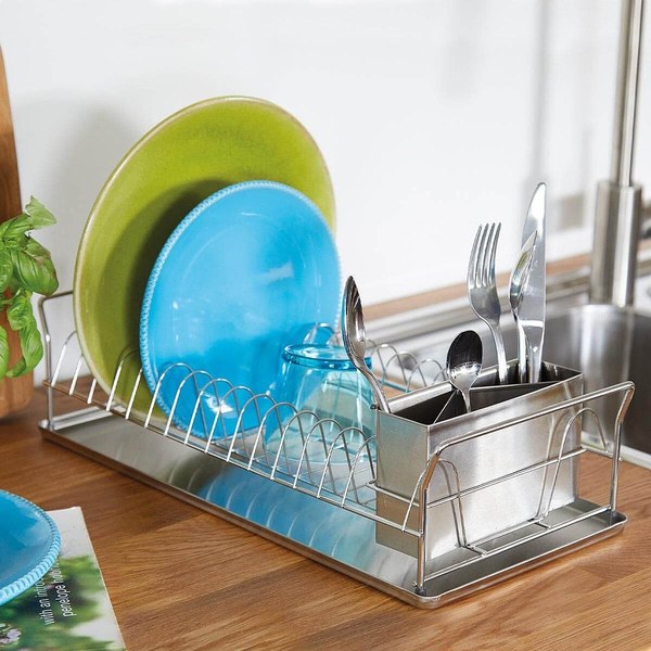 Slimline stainless steel dish rack on a kitchen worktop