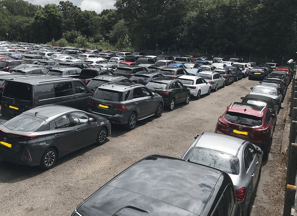 Rows of cars parked in a Maple Parking meet and greet car park