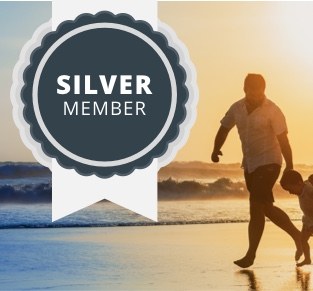 Maple Parking Silver Member badge over a beach scene