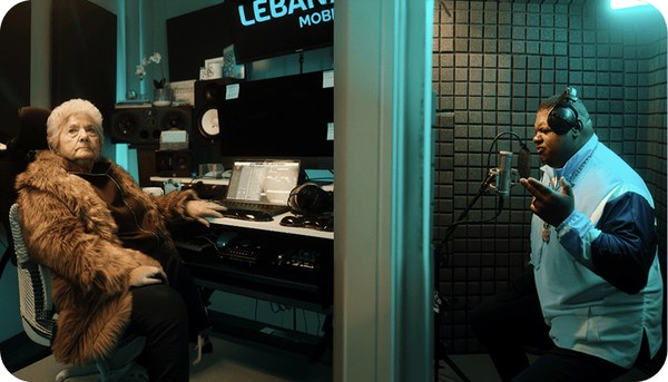 Lebara campaign photo of a presenter in a recording studio
