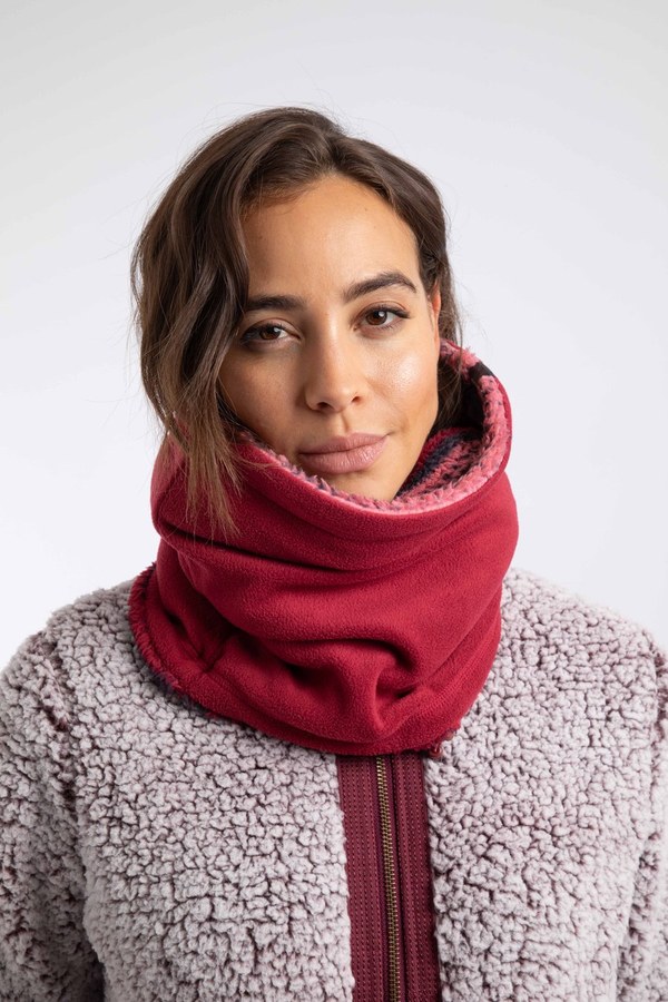 Model wearing the Weird Fish Thea printed reversible fleece snood in red grape