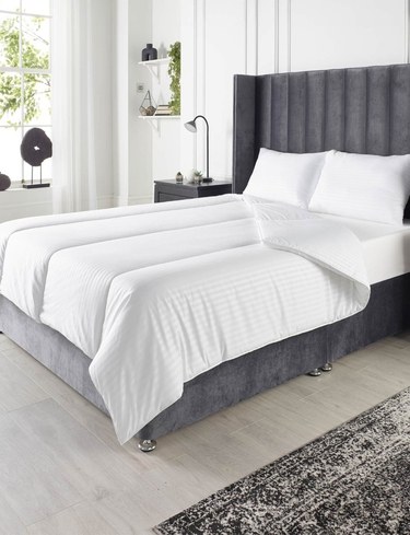 Which Tog Duvet Do You Need This Winter? A Practical Guide with Chums Duvet Options Chums Downland Hotel Quality 4.5 tog duvet on a made bed with white satin stripe cover