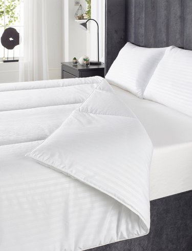 Close-up of the Chums Downland Hotel Quality duvet with an embossed satin stripe cover